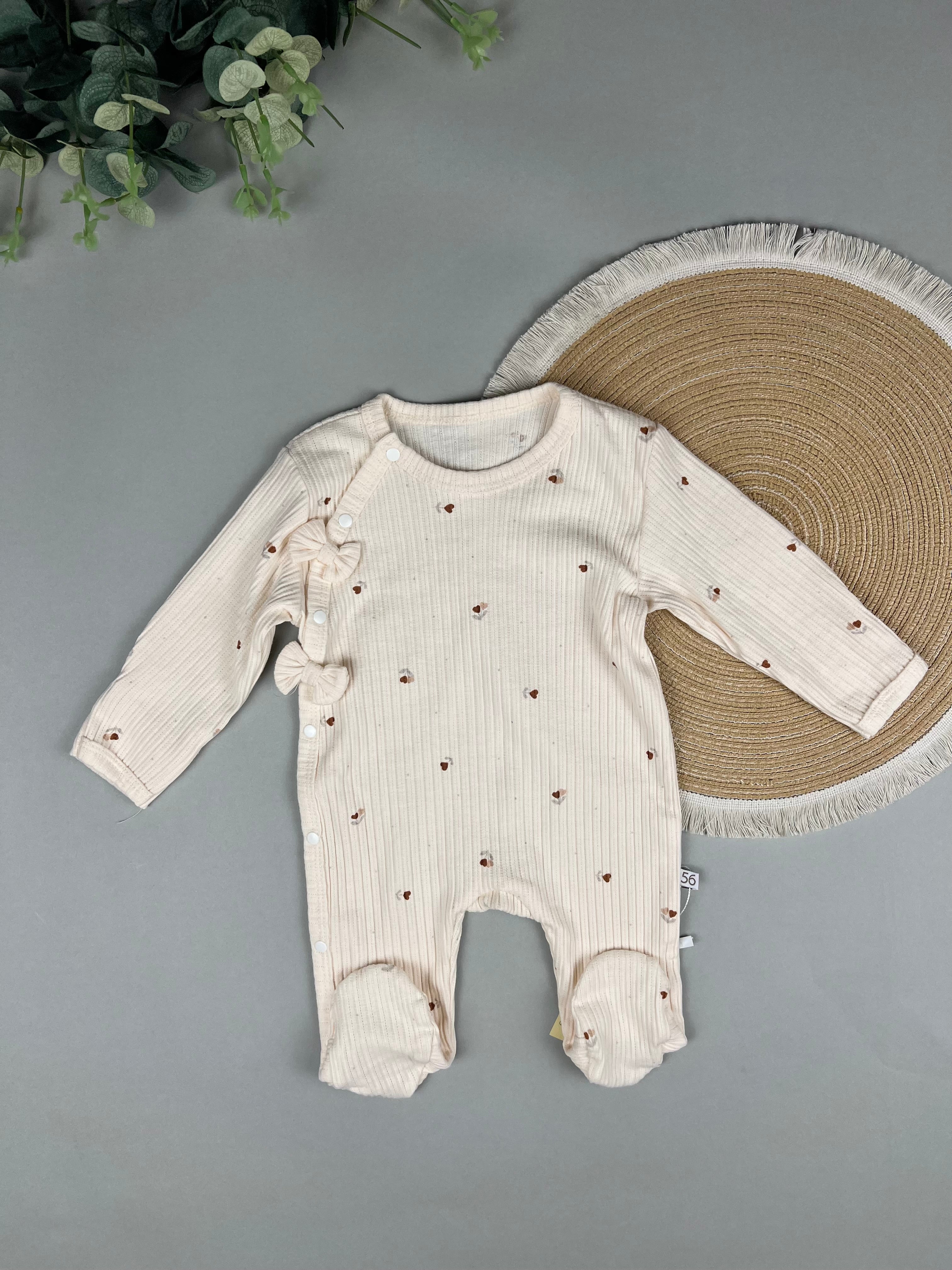 Floral overall with bow details